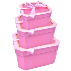 Conjunto de três caixas quadradas cor-de-rosa com tampas transparentes e laços decorativos