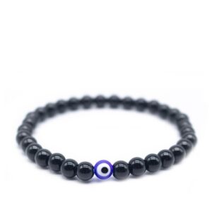 Pulseira com pedras semipreciosas pretas redondas e um amuleto central do Olho Turco