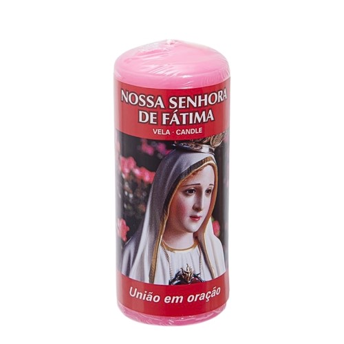Vela branca com imagem de Nossa Senhora de Fátima e símbolo AUM, usada em rituais espirituais