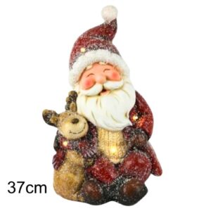 Decoração natalícia com figura de Pai Natal e rena iluminada por pequenas luzes LED