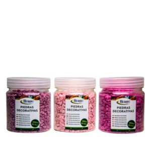 Frascos de pedras decorativas rosa em três tons